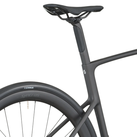 Close-up of a bicycle seat and frame on a white background