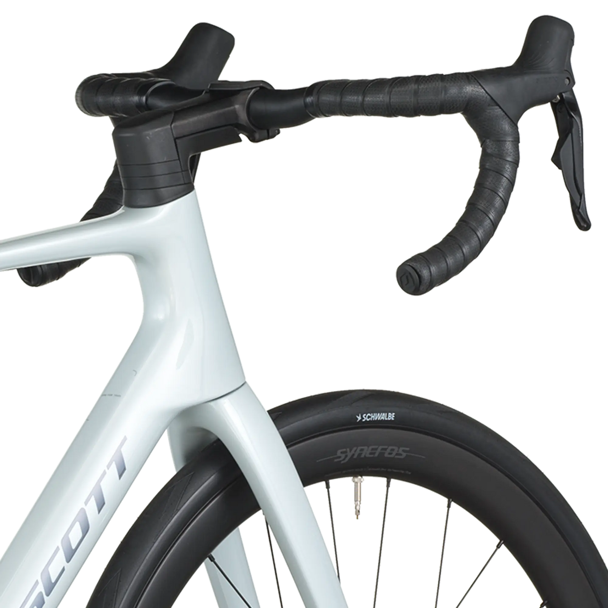 Close-up of a bicycle handlebar with white frame and black tires on a white background