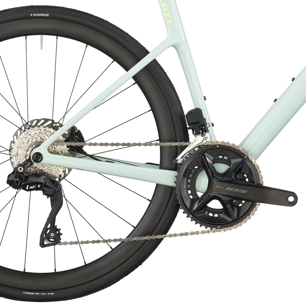 Close-up of a bicycle's rear wheel and gear system on a white background