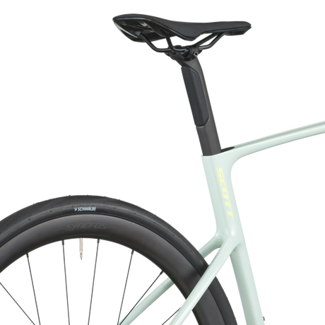 Close-up of a bicycle seat and frame on a white background