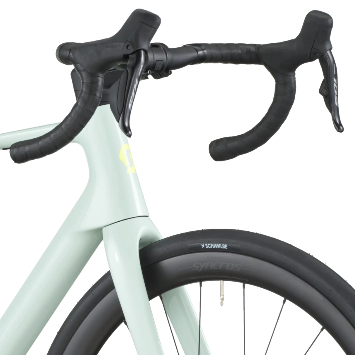 Close-up of a bicycle handlebar with a light green frame and black components on a white background.