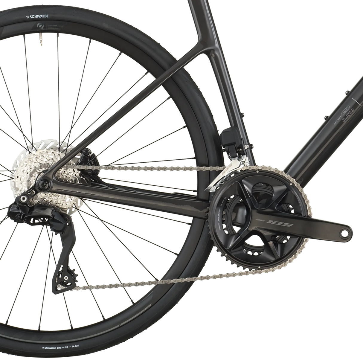 Close-up of a bicycle's rear wheel and gear system on a white background