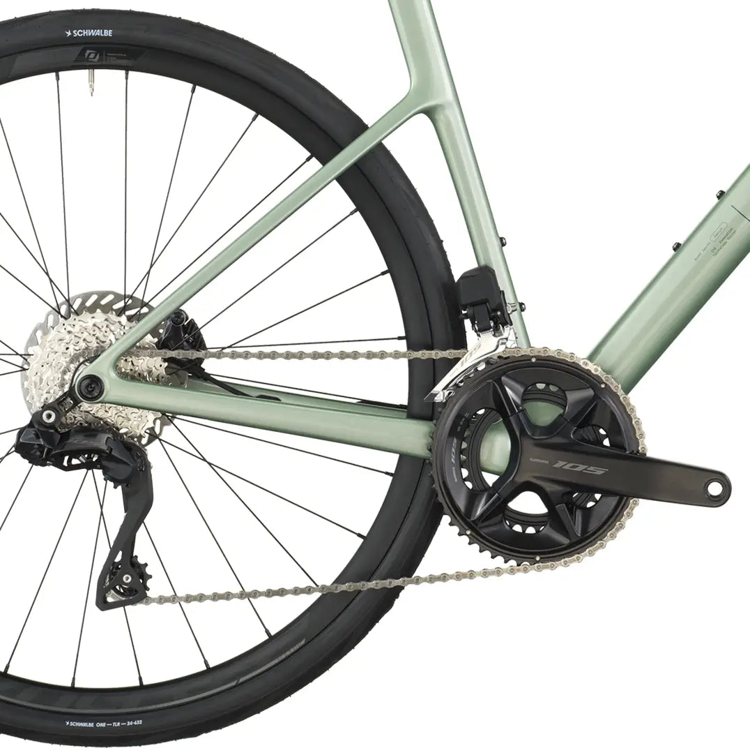 Close-up of a bicycle wheel and gear system on a white background