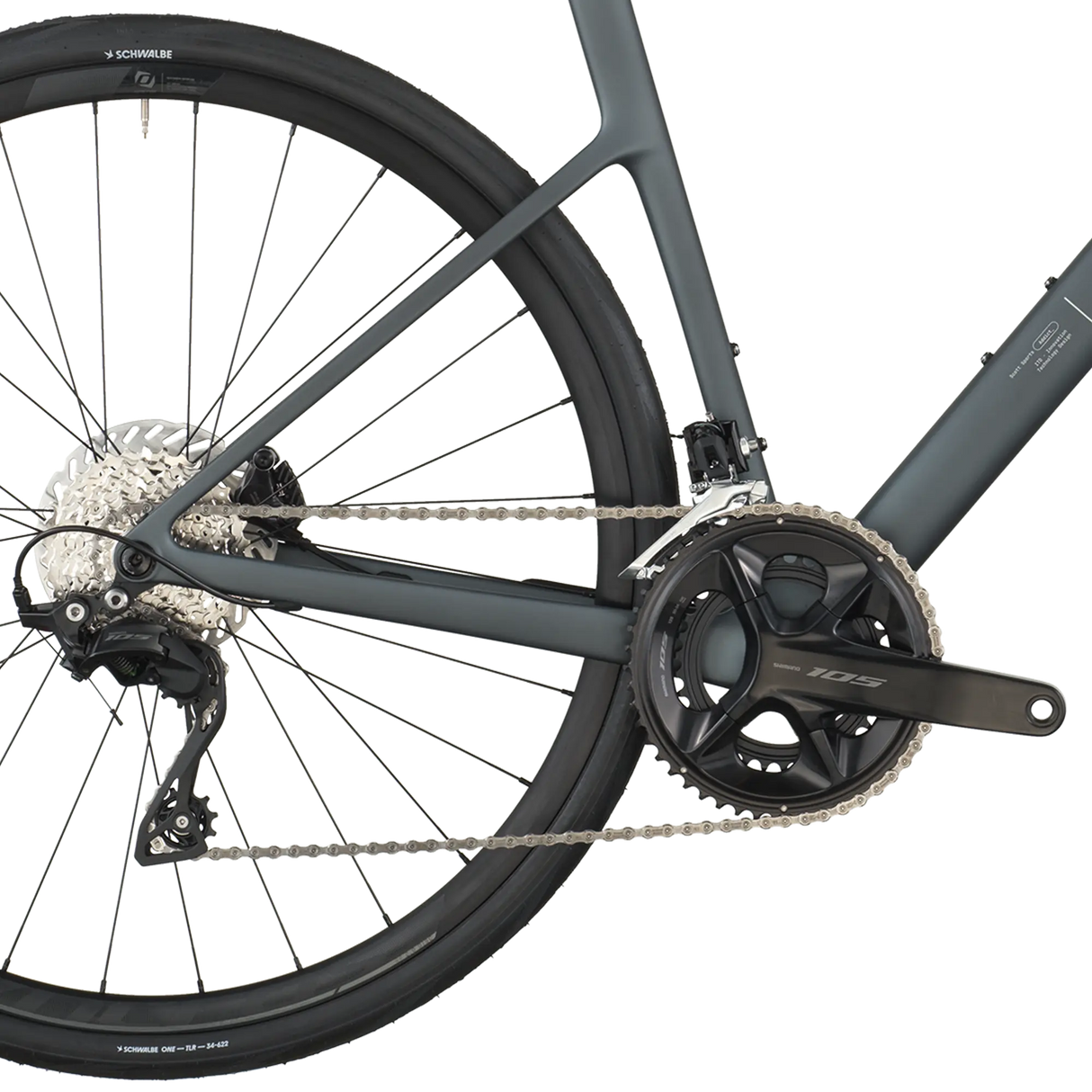 Close-up of a bicycle's rear wheel and gear system on a white background