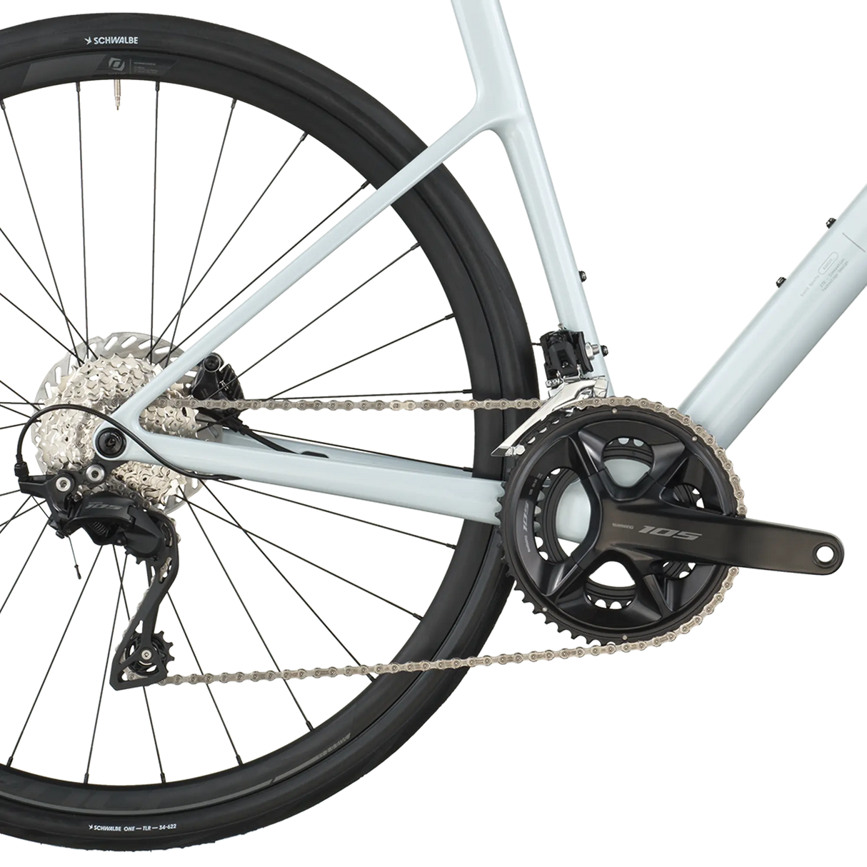 Close-up of a bicycle's rear wheel and gear system on a white background
