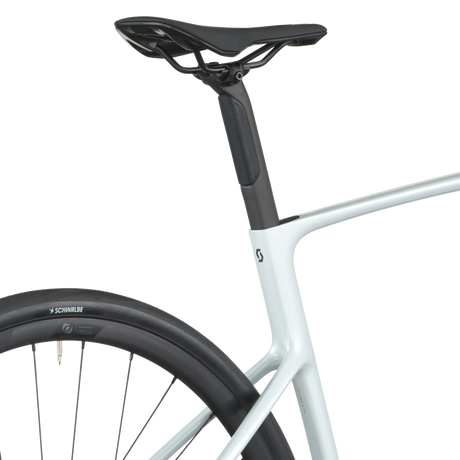 Close-up of a bicycle seat and frame on a white background
