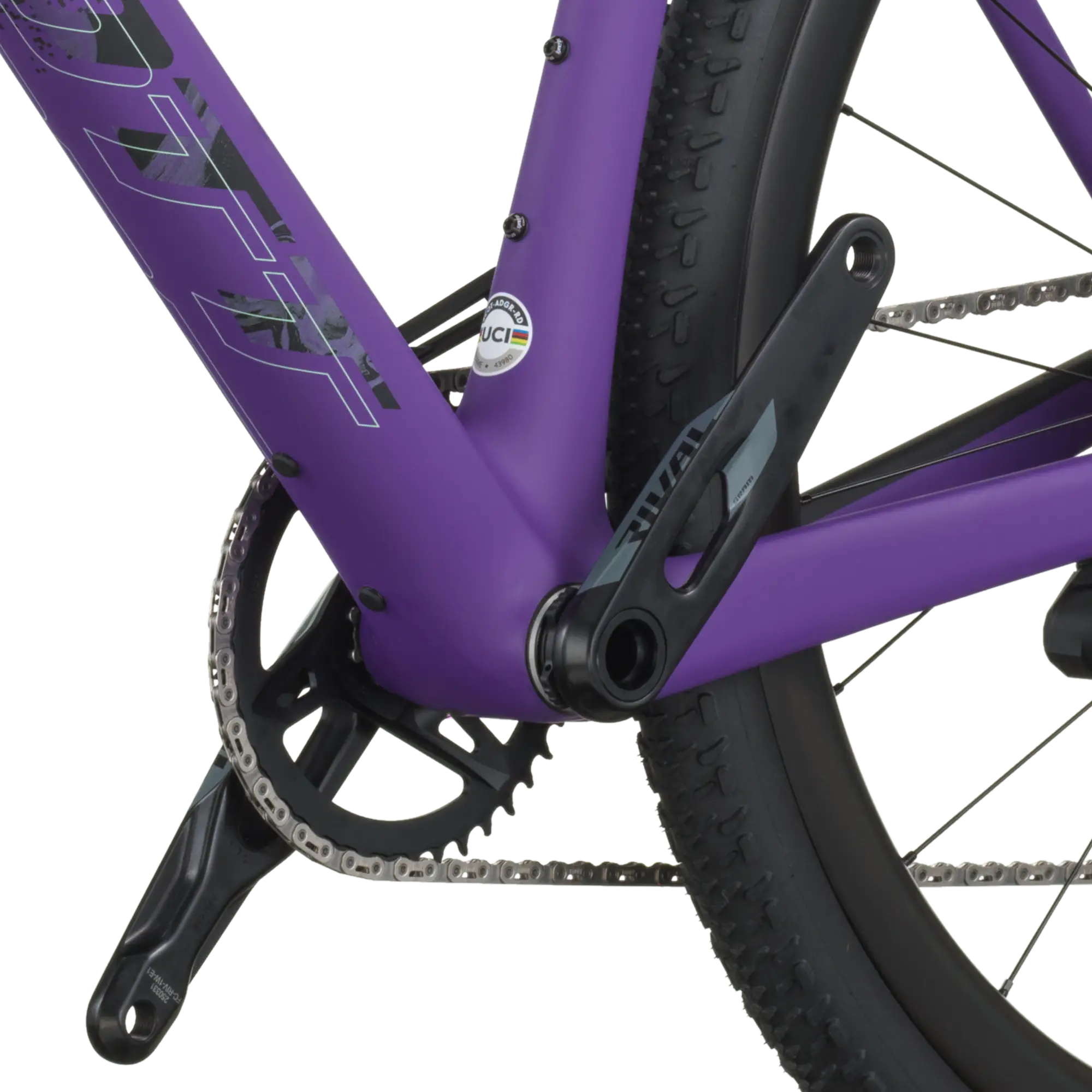Close-up of a purple bicycle frame with chain and wheel on a white background