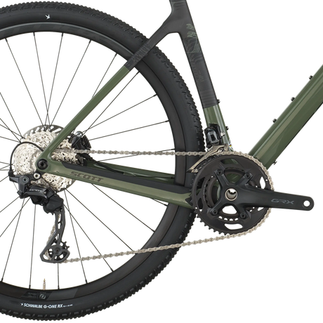 Close-up of a bicycle chain and gear system on a white background