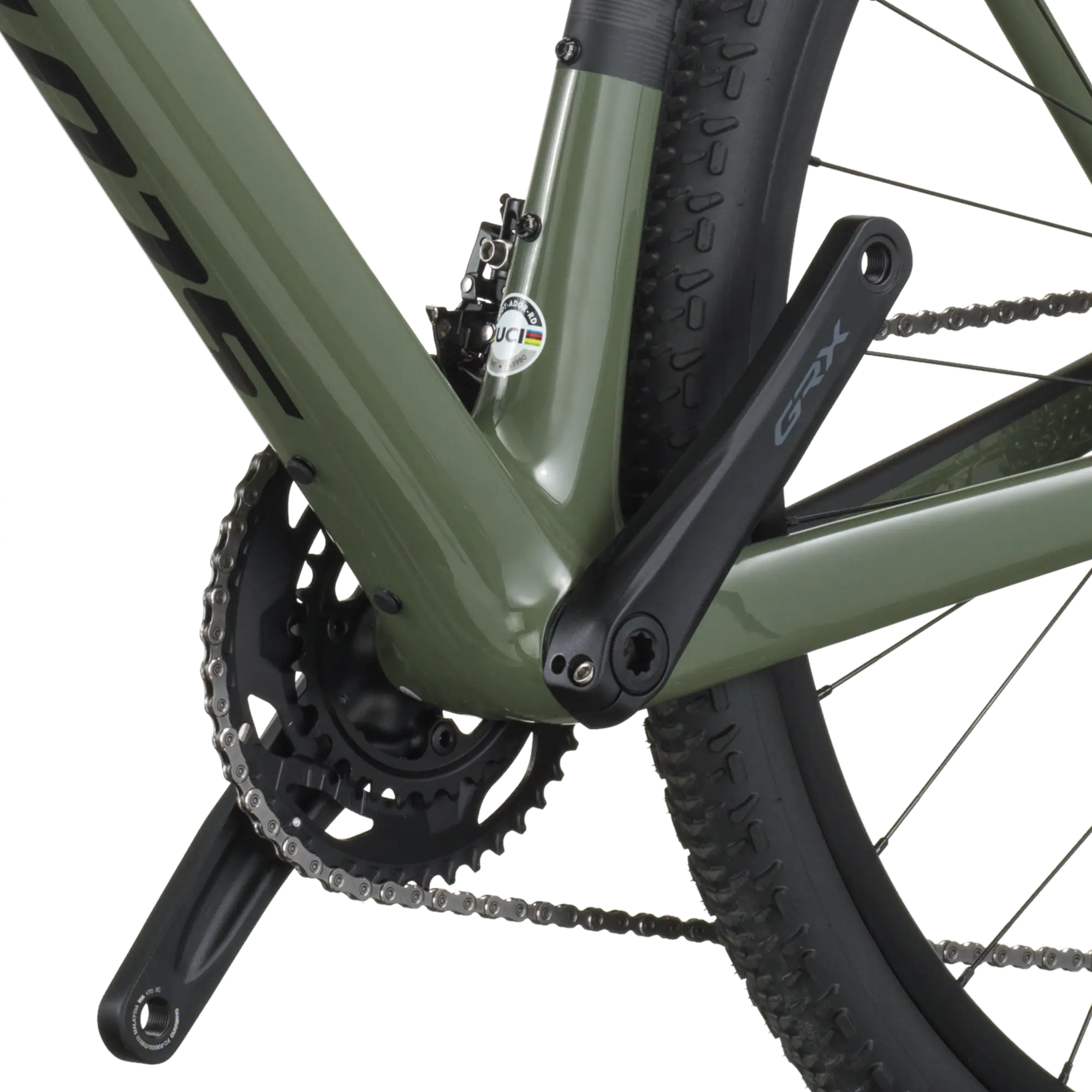 Close-up of a bicycle chain and gear system on a white background