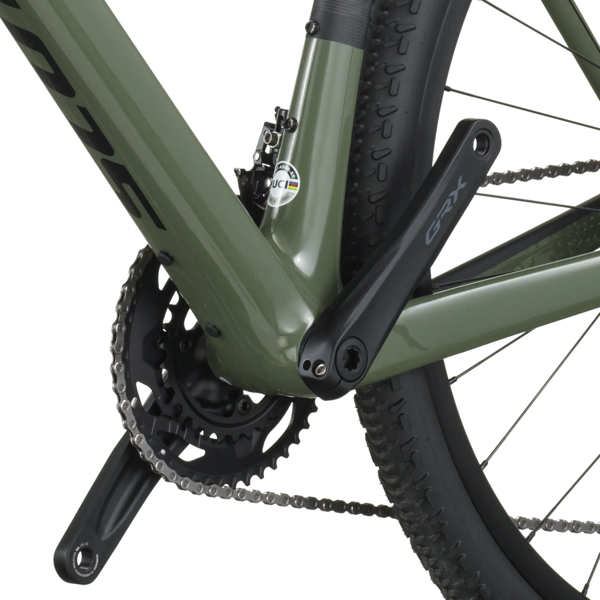 Close-up of a bicycle chain and gear system on a white background