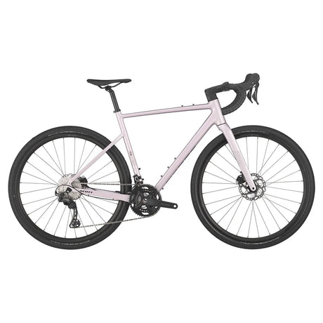 Scott Speedster Gravel 10 in light pink with black accents, designed for versatile gravel riding with a sleek and stylish frame.