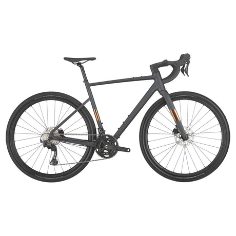 Scott Speedster Gravel 10 in matte black with copper accents, featuring a lightweight frame, drop handlebars, and all-terrain tires.