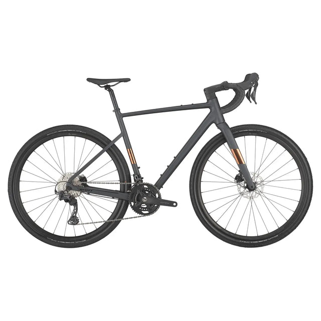 Scott Speedster Gravel 10 in matte black with copper accents, featuring a lightweight frame, drop handlebars, and all-terrain tires.
