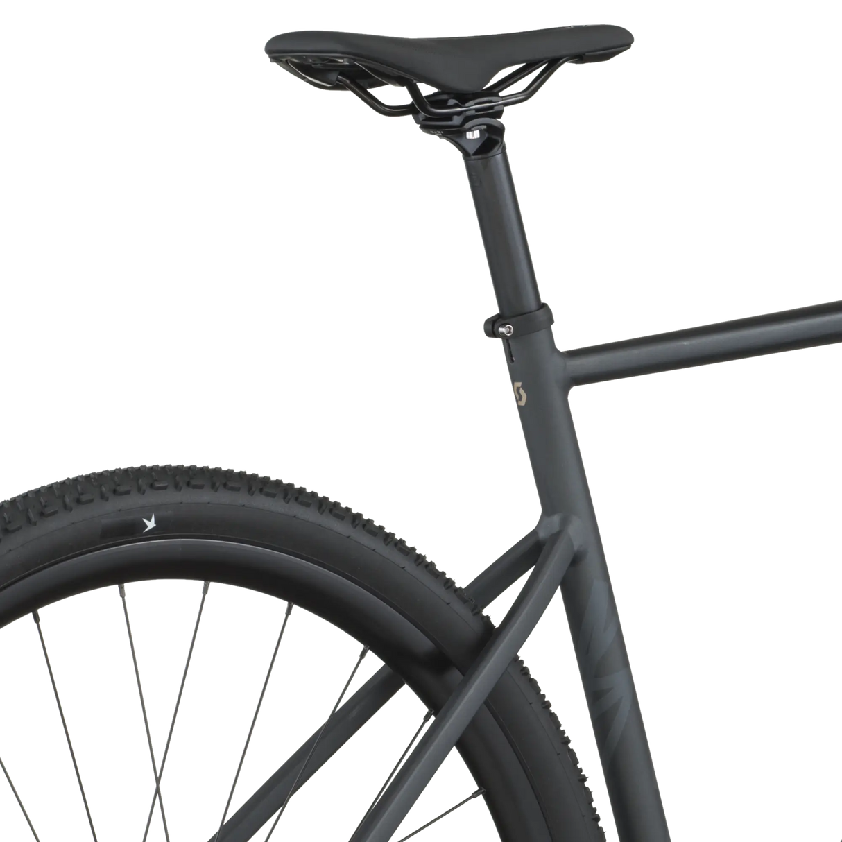 Close-up of a black bicycle frame and wheel on a white background