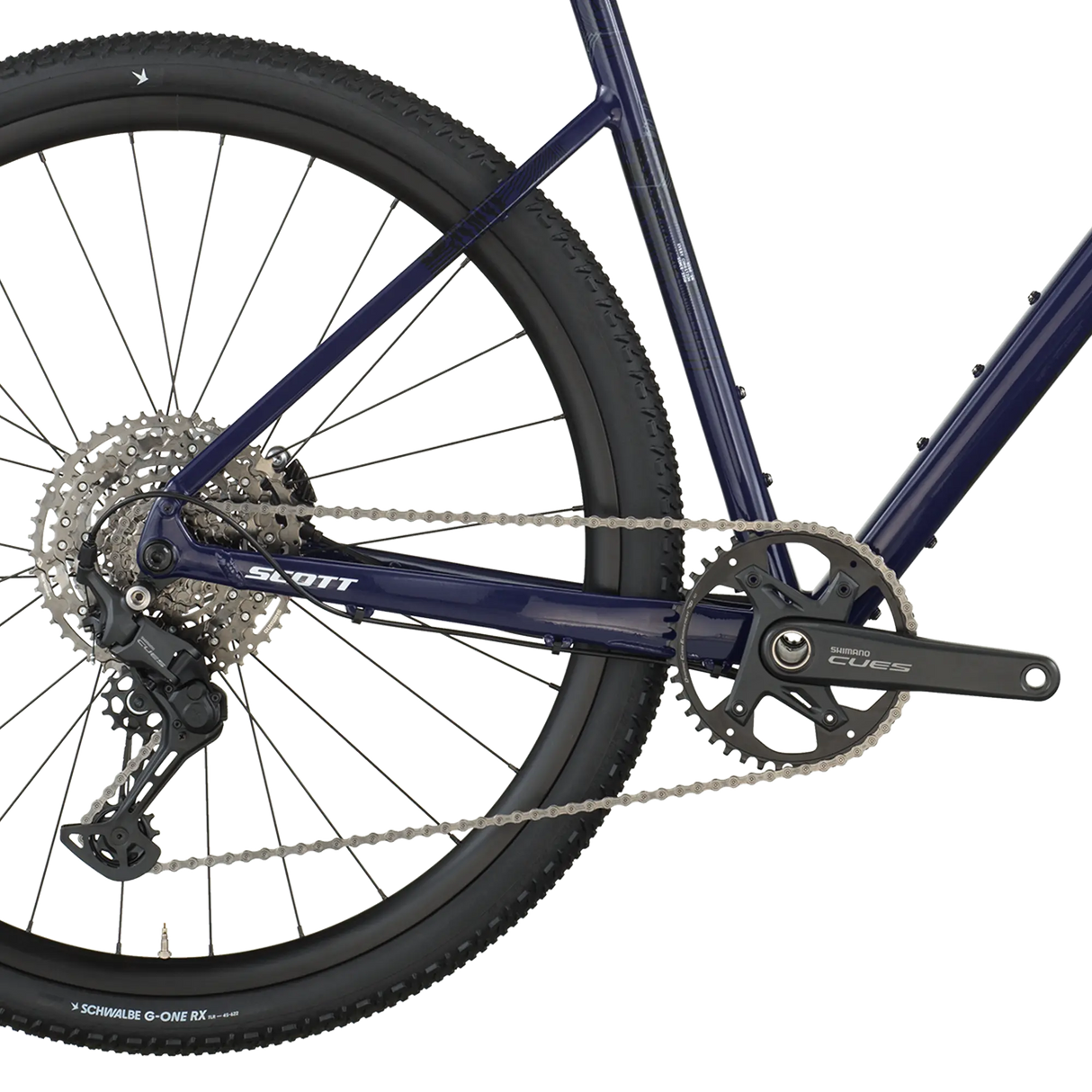 Close-up of a bicycle chain and gear system on a white background