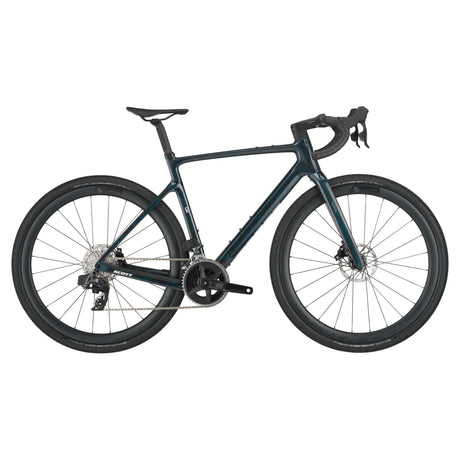 Scott Addict Gravel 20 Carbon Gravel Bike in dark green with carbon frame and wide tires, designed for rugged gravel adventures.