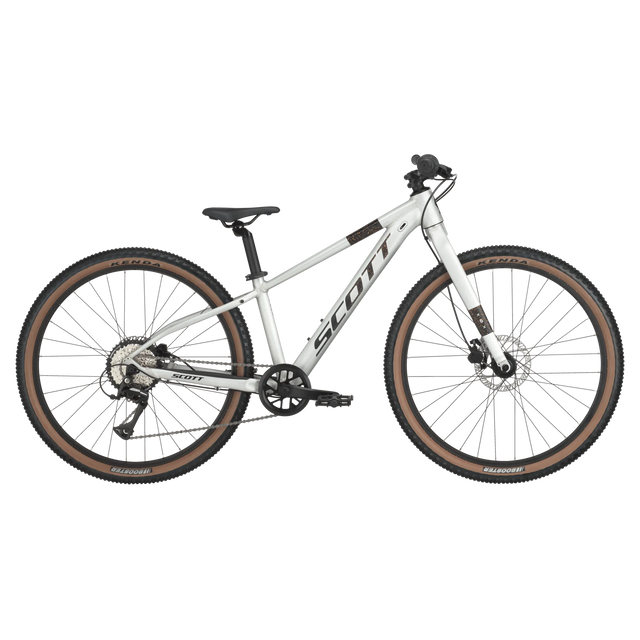 Scott Scale 600 26" Kids Bike in silver with brown Kenda tires, designed for young riders seeking performance and durability on trails.