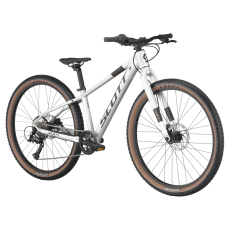Angled view of Scott Scale 600 26" Kids Bike in silver, featuring disc brakes and a lightweight frame for off-road cycling adventures.