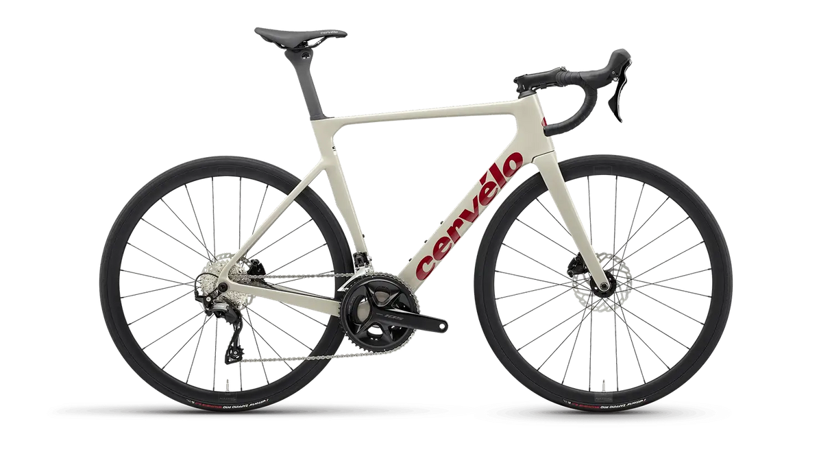 Cervelo Soloist 105 Road Bike in white with red logo, aerodynamic carbon frame, Shimano 105 groupset, ideal for competitive road cycling.