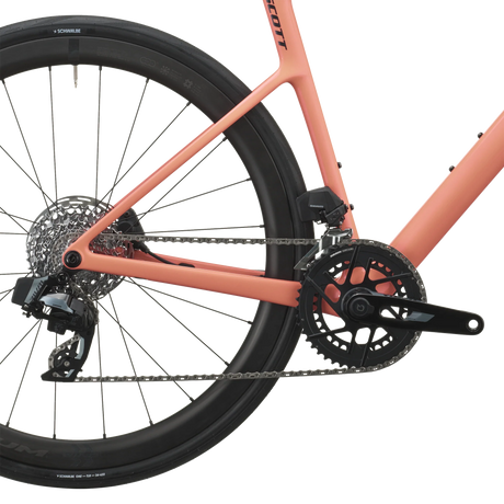 SRAM Rival AXS rear derailleur and cassette on the peach pink Scott Addict 25, with Fulcrum Wind 42 carbon wheel.