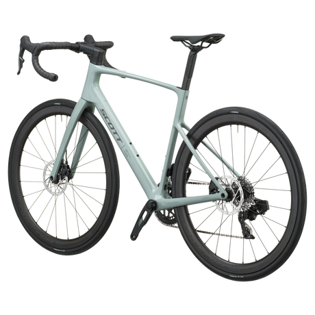 Iron grey Scott Addict 25 road bike from the non-drive side, showing the dropped seat stays and disc rotors.