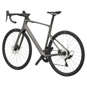 Tungsten grey Scott Addict 50 road bike from the non-drive side, showing the dropped seat stays and disc rotors.