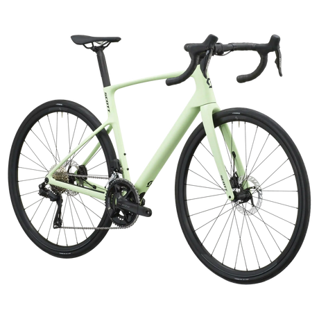 Cream green Scott Addict 40 road bike from a front three-quarter angle showing the aero head tube and drop bars.