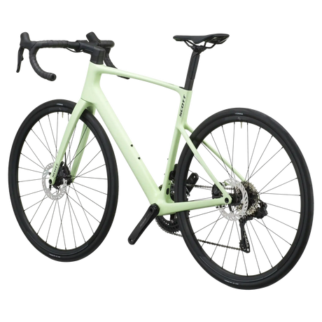 Cream green Scott Addict 40 road bike from a rear three-quarter angle showing the dropped seat stays and disc rotors.