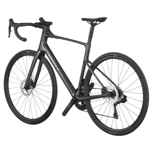 Carbon black Scott Addict 40 road bike from a rear three-quarter angle showing the dropped seat stays and disc rotors.