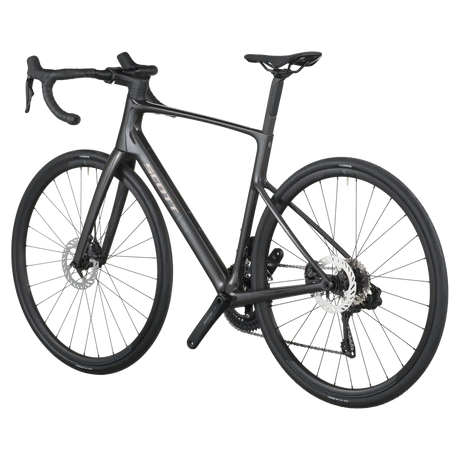 Carbon black Scott Addict 40 road bike from a rear three-quarter angle showing the dropped seat stays and disc rotors.