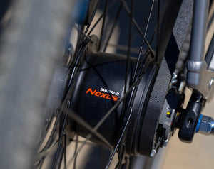 Close-up of a Shimano Nexus gear system on a bicycle.
