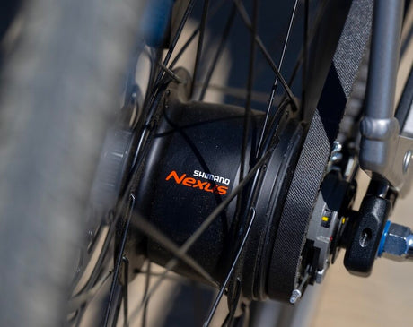 Close-up of a Shimano Nexus gear system on a bicycle.