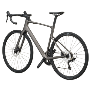 Tungsten grey Scott Addict 50 road bike from the non-drive side, showing the dropped seat stays and disc rotors.