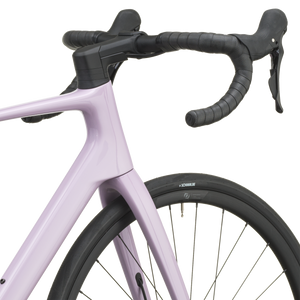 Mallow pink Scott Addict 50 road bike from a front three-quarter angle with the SCOTT logo on the down tube.