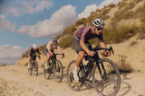 Group of riders climbing a sandy track on Argon 18 Anti Matter gravel bikes