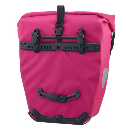 Cyber pink Ortlieb Back-Roller 20L pannier bag with black mounting hardware and reflective side patch.