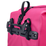Cyber pink waterproof pannier bag with black adjustable mounting hooks and straps, 20L capacity.