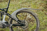 Mudhugger MK2 rear mudguard fitted to the seat stays of a full suspension mountain bike outdoors