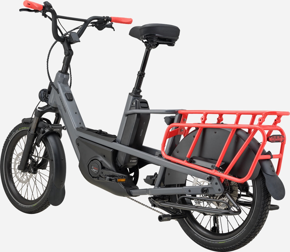 Rear-side angle of Cannondale Cargowagen Neo 2 Electric Cargo Bike highlighting Bosch motor, padded saddle, and spacious cargo platform.