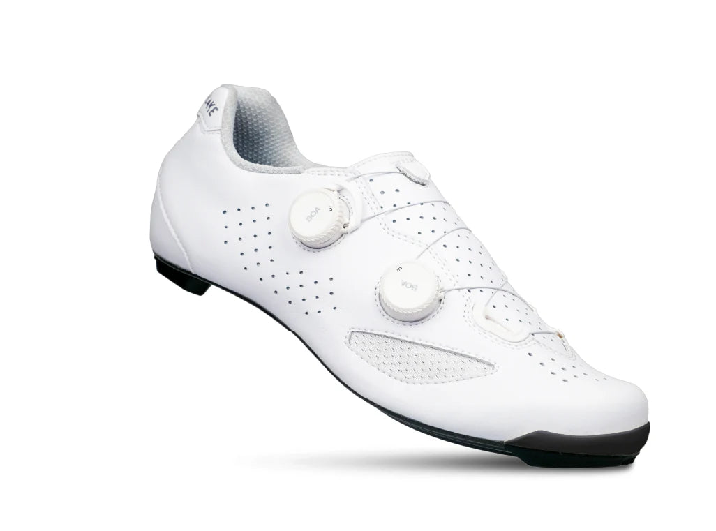 White cycling shoe with black sole on a white background
