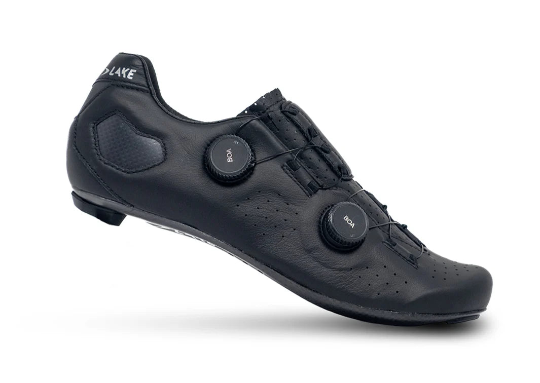 Black cycling shoe with brand logo on a white background