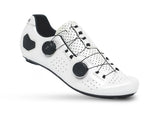 White cycling shoe with black accents on a white background