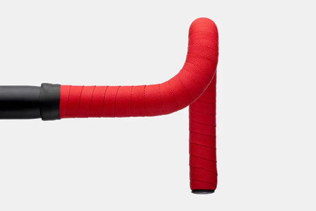 Red Cannondale KnurlTack bar tape on handlebar