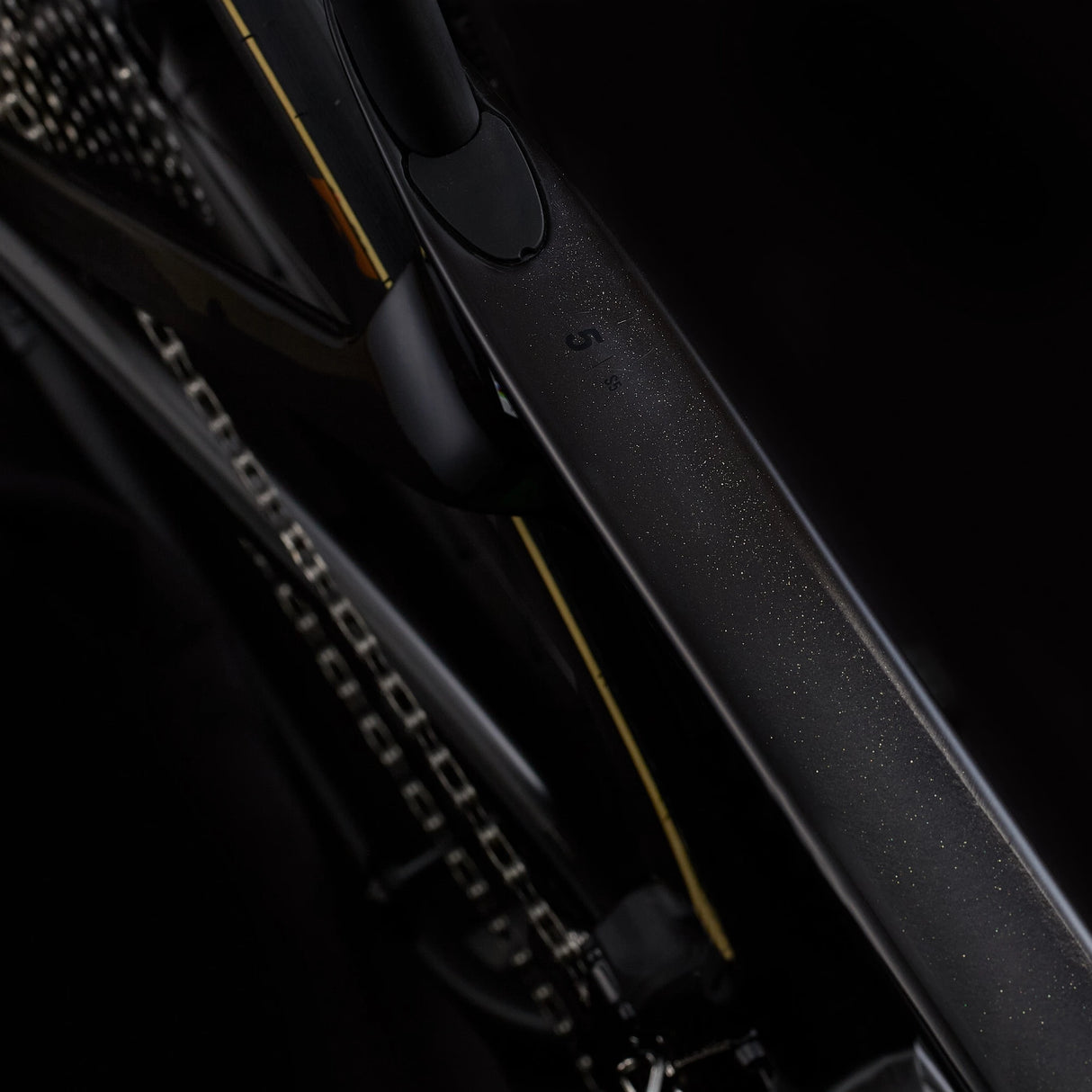 Top tube view of black Cervélo S5 Dura-Ace Di2 Road Bike showing sleek carbon finish and internal cable routing for aerodynamic efficiency.