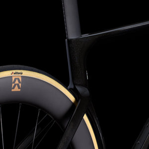 Rear triangle of black Cervélo S5 Dura-Ace Di2 Road Bike with deep-section Reserve wheel and seamless carbon frame junction for speed and stiffness.