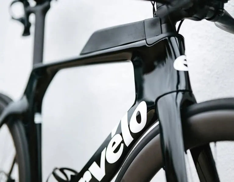 Close-up of the Cervelo P Series Ultegra Di2 Time Trial Bike's aerodynamic frame and integrated storage, designed for triathlon efficiency.