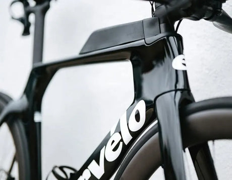 Close-up of the Cervelo P Series Ultegra Di2 Time Trial Bike's aerodynamic frame and integrated storage, designed for triathlon efficiency.