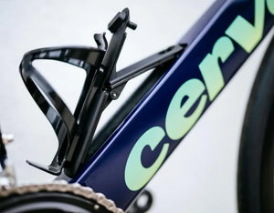 Detailed view of the Cervelo P Series Ultegra Di2 Time Trial Bike's bottle cage mounted on the downtube, enhancing hydration accessibility.