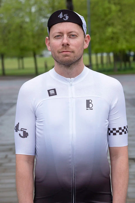 Front view of the 45th Anniversary Short Sleeve Mens Jersey showing gradient design, Sportful logo, and Billy Bilsland Cycles branding.