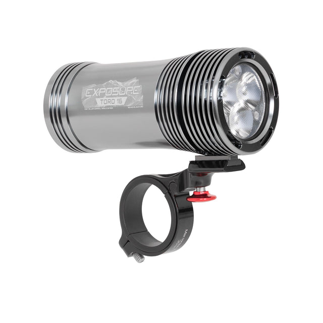 Exposure Toro Mk16 bike light in gunmetal grey with its quick release handlebar bracket